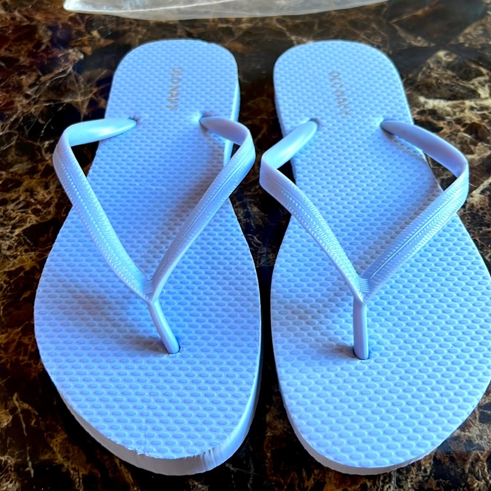 Old navy blue flip flops